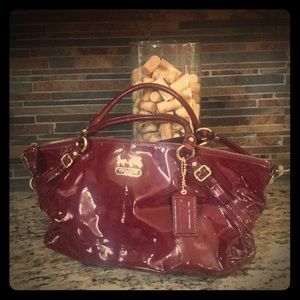 Used authentic burgundy Coach purse